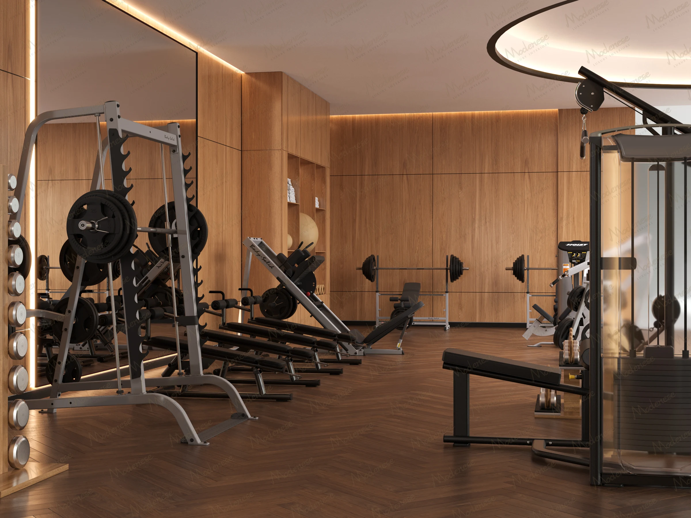 Strength training area featuring squat racks, benches, and weight machines set against sleek wood-paneled walls with integrated ambient lighting