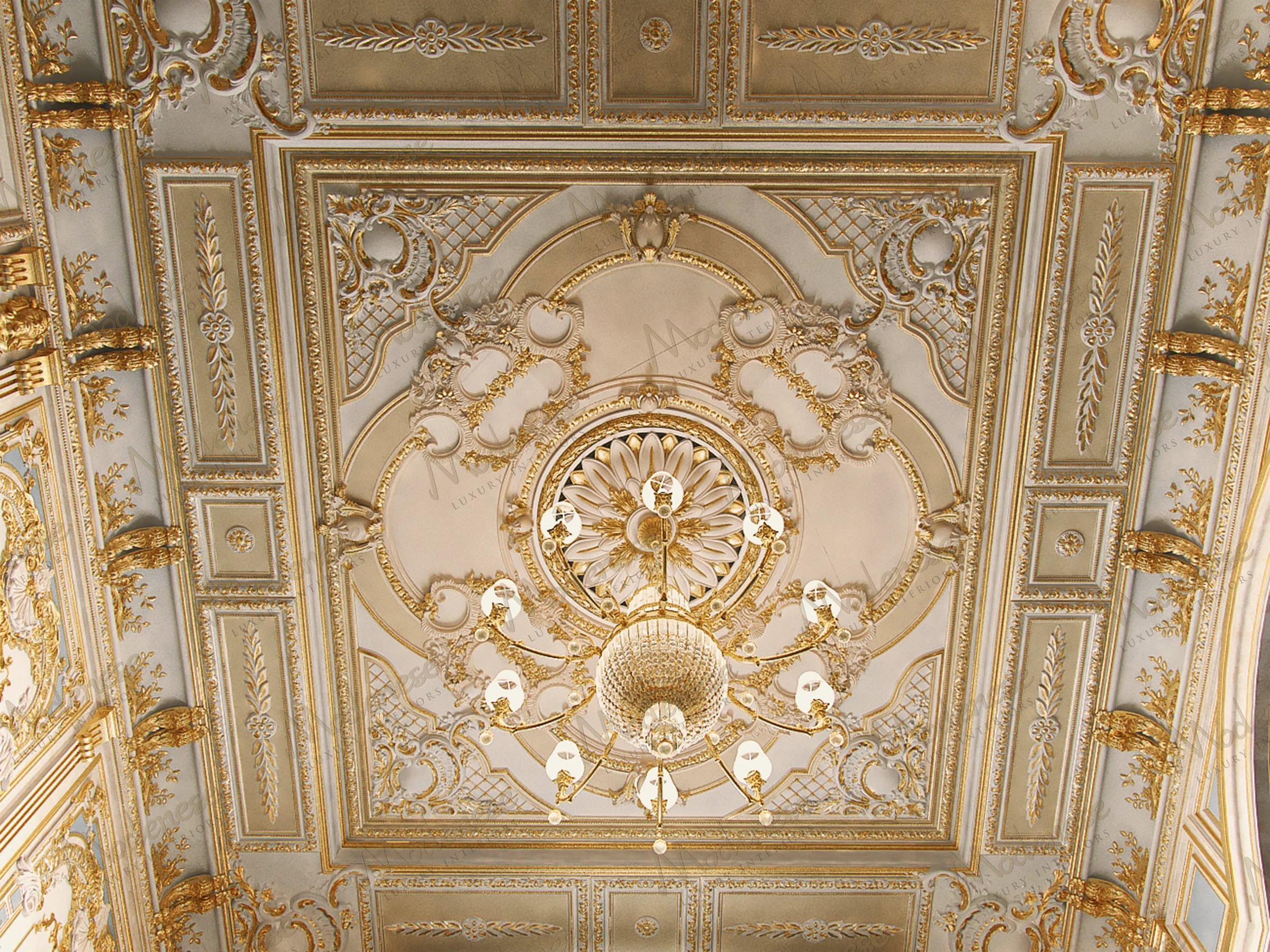 Ornate wall and ceiling gypsum decoration with gold accents, classical molding designs, and luxury architectural details crafted by Modenese Luxury Interiors