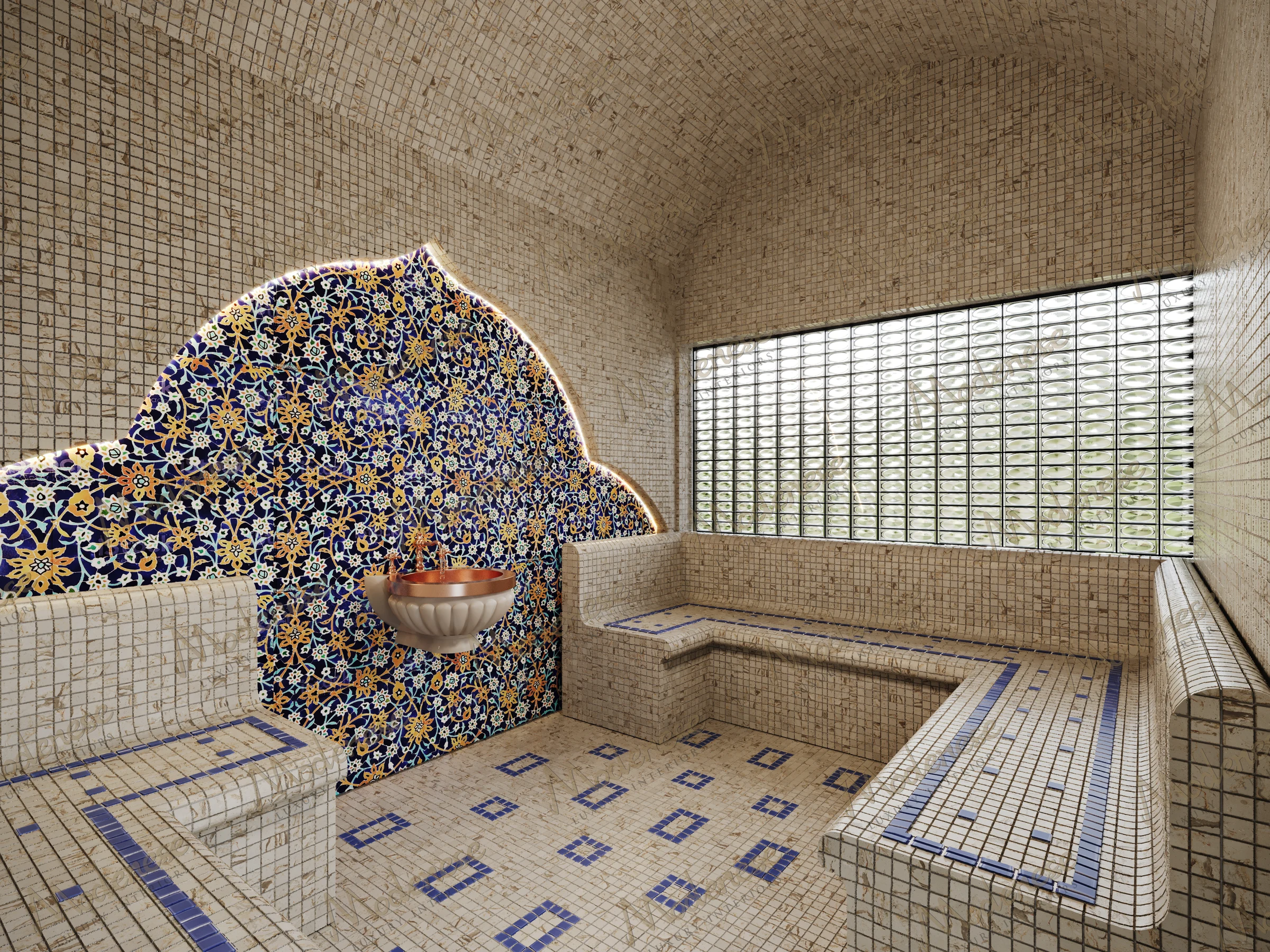 Completed Moroccan hammam interior featuring beige mosaic tile seating, a blue and gold tiled wall design, and a copper basin fountain in Marrakech