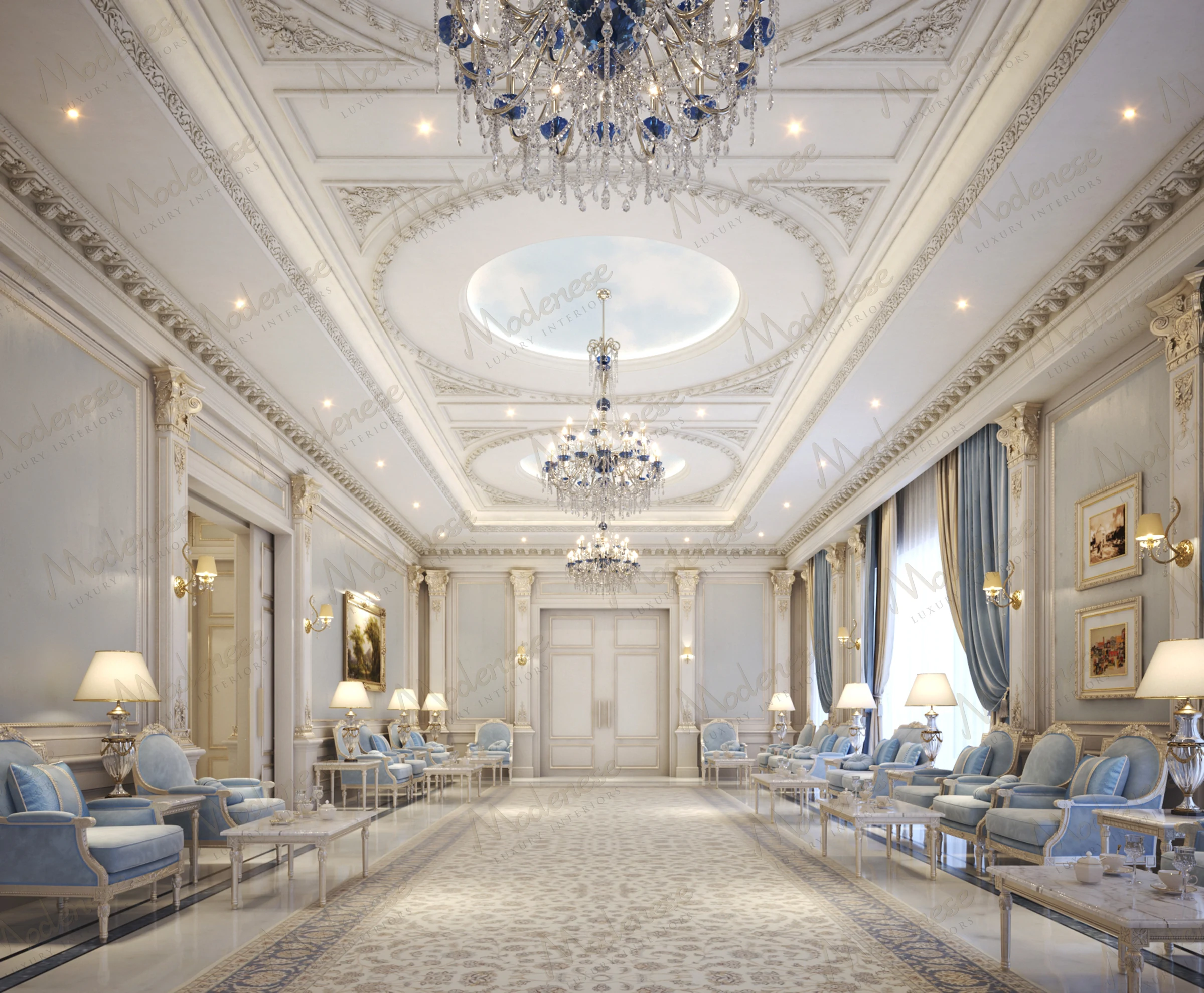 Neoclassical majilis in a reception hall in Kuwait featuring ornate ceiling moldings, blue crystal chandeliers, and plush blue armchairs arranged symmetrically beneath tall curtained windows