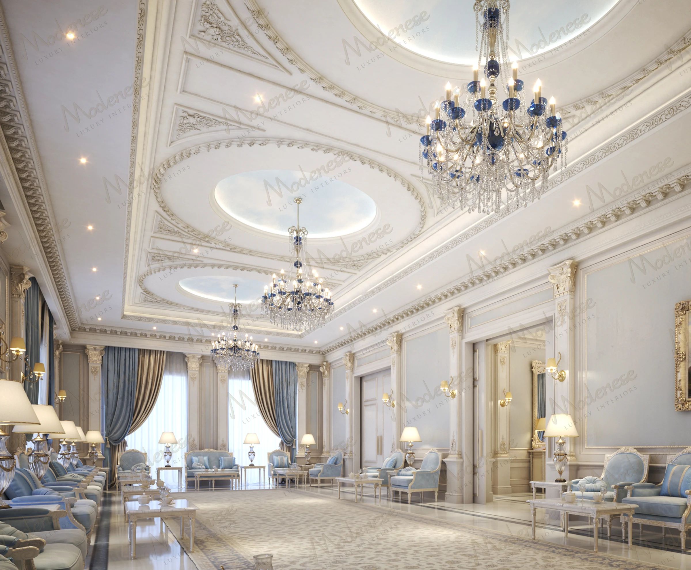Grand luxury interior in Kuwait with elaborate ceiling medallions, cascading chandeliers, and light blue and cream furniture set along the perimeter of a spacious formal salon